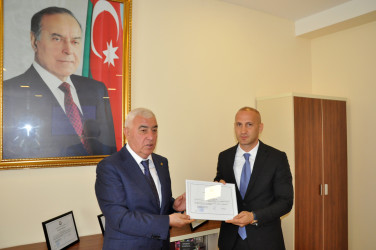 Dövlət qulluqçularının peşə bayramı gününə həsr olunmuş tədbir keçirilib